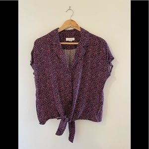 Miniature floral-patterned blouse with tie.